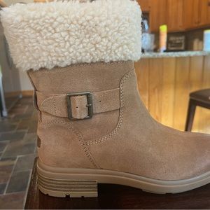 Ugg Sherpa lined boots. Zips on side. Brand new. Size 7.5